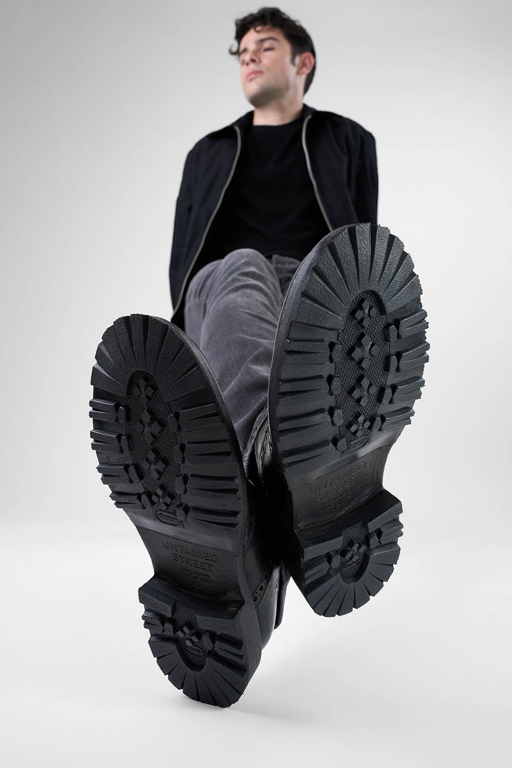 DRAKE jet-black brogue derby shoes.