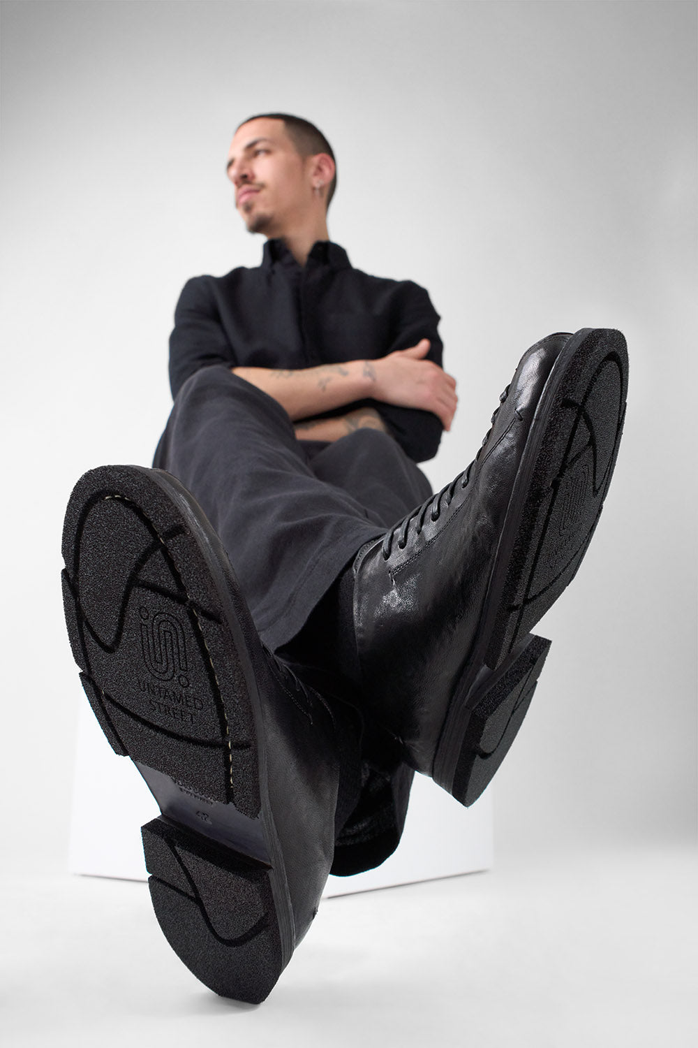 HARVEY rugged-black tip-laced shoes.