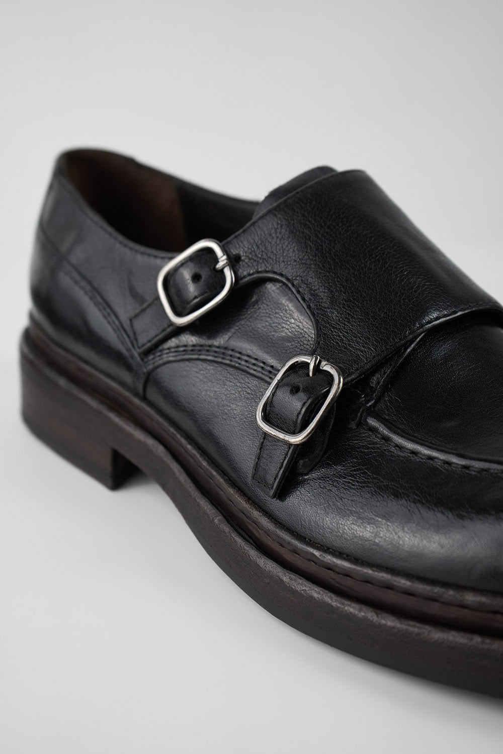 LAMBETH jet-black welted monk shoes.