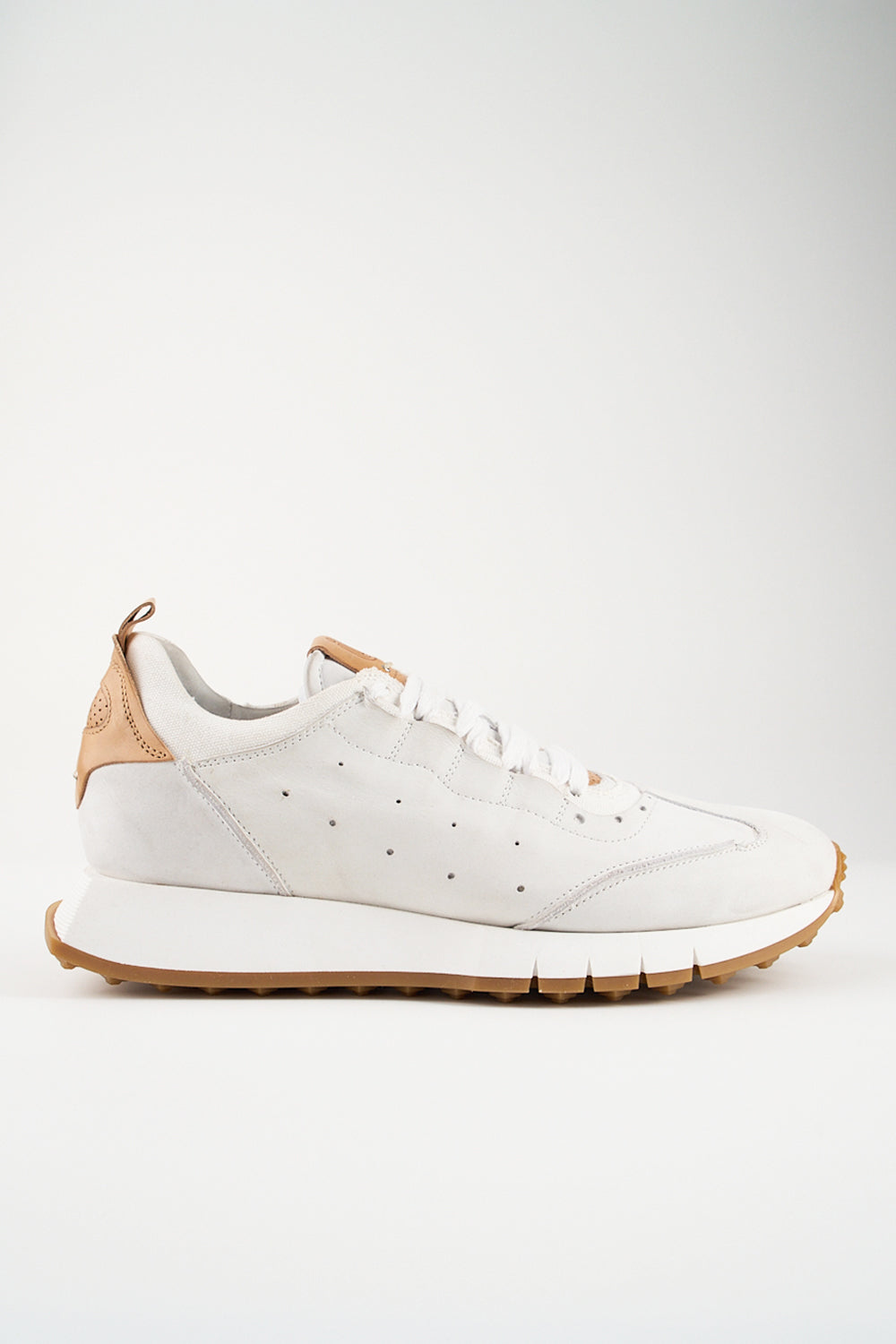 PEARCE limestone-white nubuck wingtip runners.