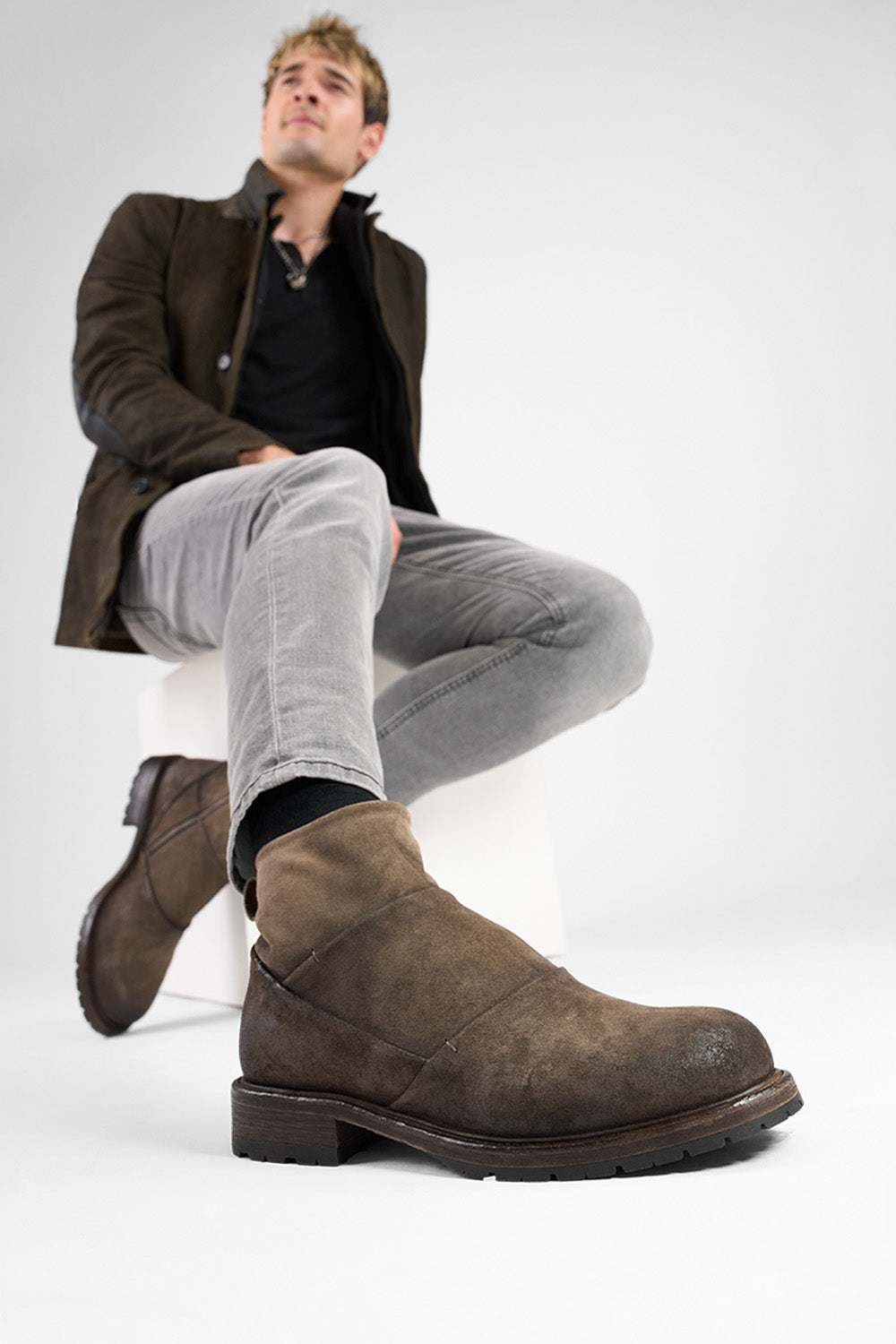 ROWLEY dark-earth folded suede laceless boots.