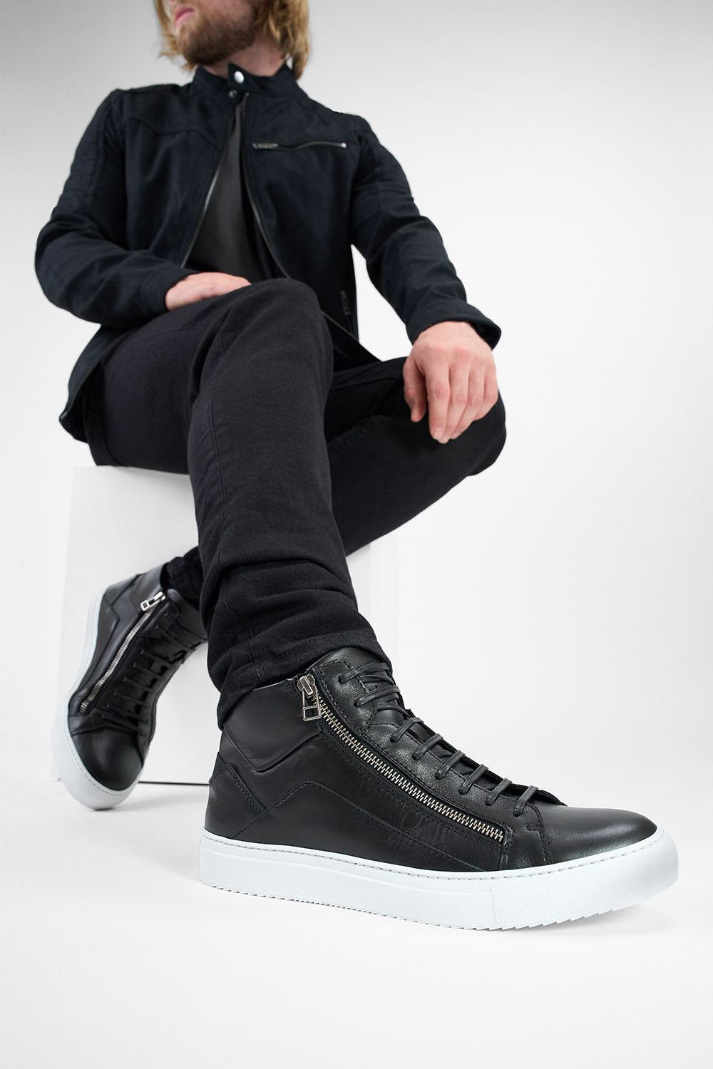 SKYE tuxedo-black triple stitched high sneakers.