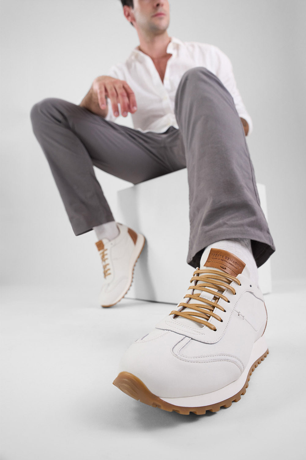 SOHO white-whisper wingtip runners.