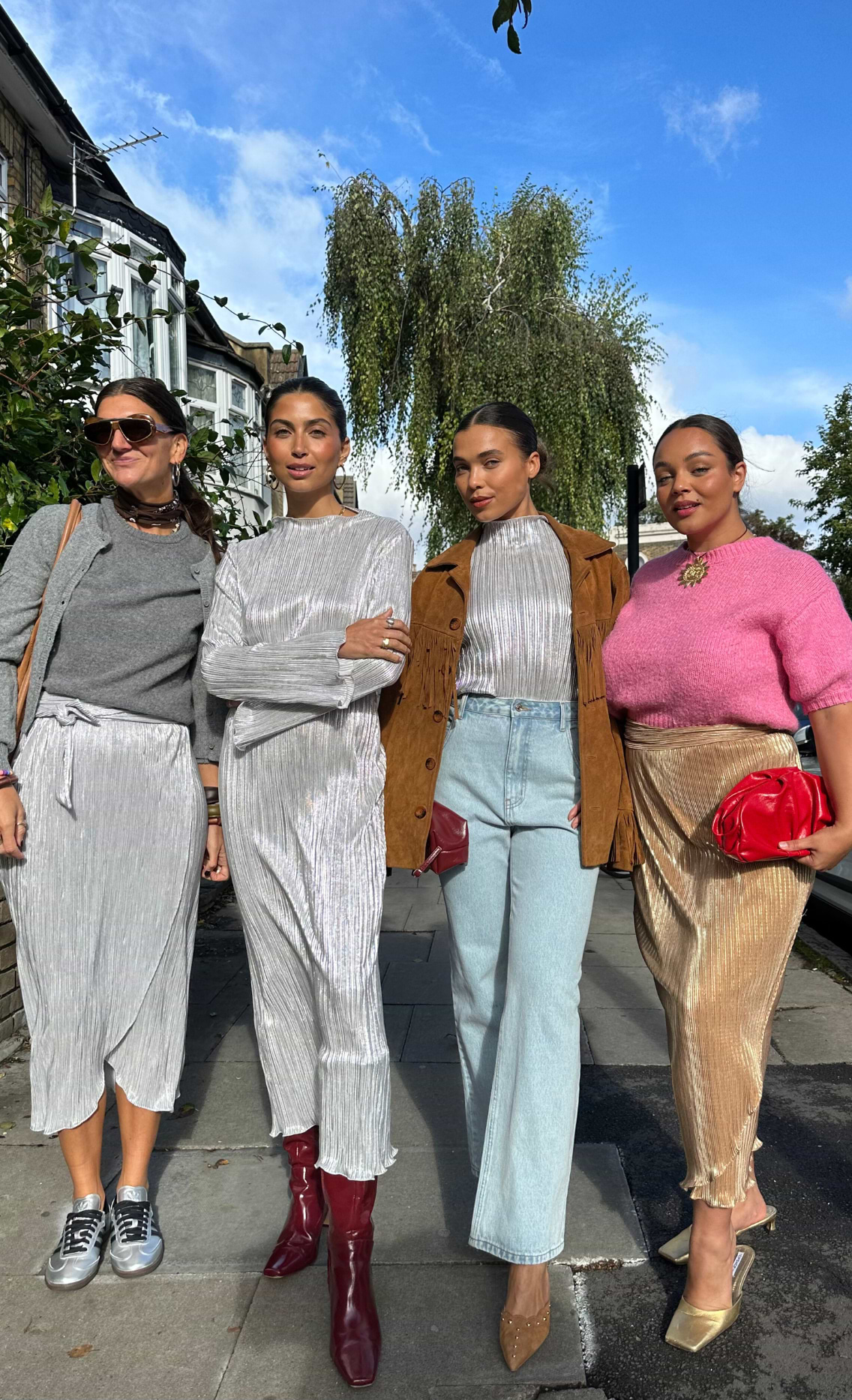 Lucy with three models wearing different versions of our plisse fabric