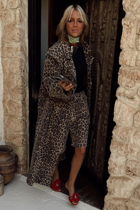 Lucia Leopard Denim 55 Coat Petite in iconic leopard print, layered with matching shorts for a transeasonal look.