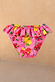 Girls Pink Fruit Bikini Bottoms with a frill waistband and Mediterranean-inspired fruit print.