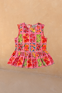 NFD Kids pink sleeveless peplum top with a Mediterranean-inspired fruit print in 100% cotton.