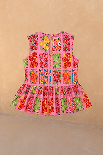 NFD Kids Pink Fruit Peplum Top with a Mediterranean fruit print, sleeveless cotton and back button detail.
