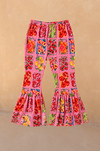 NFD Kids pink fruit print cotton trousers featuring a wide leg and statement gathered frill hems.