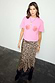 Thumbnail for Pink Rose Boob T-Shirt featuring red rose prints, styled with a leopard print lace-trim midi skirt.