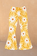 Girl's yellow cotton flared trousers in the iconic soleil sun print with an elasticated waistband.