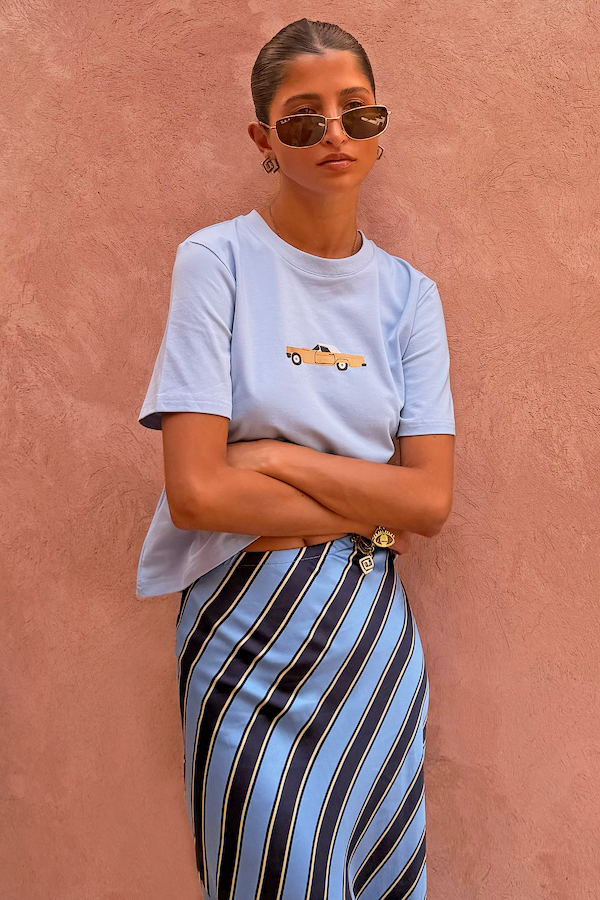 Light blue cotton Cadillac Baby T-Shirt with a retro car motif and striped skirt, designed in London.