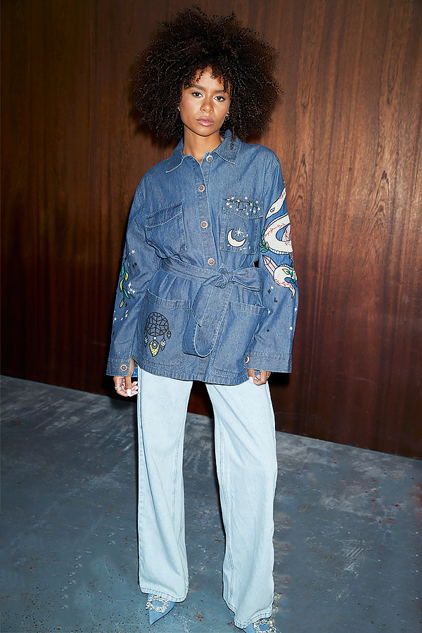 Blue Denim Manifestation Jacket featuring tarot-inspired embroidery and tie waist, styled with light wash jeans.