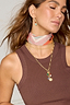 Gold Plated Balearic Sun Cluster Necklace with colourful semi-precious charms and pearl on a model.