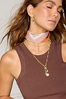 Gold Plated Balearic Sun Cluster Necklace with colourful semi-precious charms and pearl on a model.