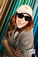 Choose Love Cap in cream with red embroidery, worn by Angela Scanlon with a checked blazer and sunglasses.