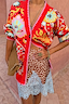 Thumbnail for Tomato Tapestry Martha Cardigan with celestial motifs and pink blanket stitch edging, styled with a lace trim mini skirt.