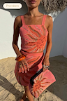 Pink Sol Beaded Top with glass bead sun embroidery and sequins, styled with a matching clutch and co-ord skirt.
