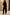 Thumbnail for Black Raffia Marra Trousers featuring tan raffia fringe at the hem, styled with a matching shirt and accessories.