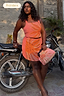 Thumbnail for Pink Sol Beaded Wrap Skirt and co-ord top with sun embroidery on a model leaning against a motorbike.