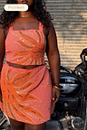 Pink Sol Beaded Top and skirt co-ord with hand-embroidered sun motifs and gold sequins, shown on a model.