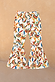 Girl's banana print cotton trousers featuring a multicoloured pattern, elasticated waist and wide flared ruffled hems.