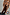 Thumbnail for Chocolate Naomi Cargo Trousers in brown satin with a balloon leg, styled with a sun-print cardigan.