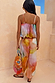 Abstract Balloon Trousers in a pink and amber sunset wash print, designed in London for vacation styling.