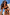 Thumbnail for Black Banana Bandeau Bikini Top with colourful embroidered motifs, styled with matching bottoms in a sunny outdoor setting.