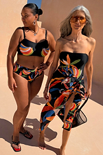 Banana High Waisted Bikini Bottoms in black with a multi-colour print on two models for inclusive sizing.