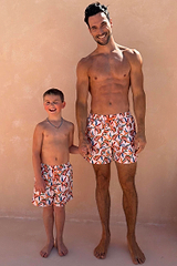 Cream Men's recycled Banana Swim Shorts with a multi-coloured print, for a matching father and son vacation look.