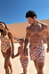 Cream Men's Banana Swim Shorts with a multi-coloured print and drawstring, part of a matching family vacation look.