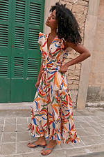 Banana Saige Skirt in cream cotton with a bold multicolour banana print and frill hem, styled as a vibrant co-ord.