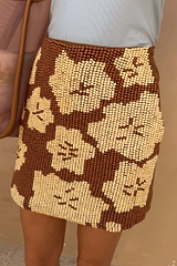 Brown Jaden Beaded Skirt featuring cream floral beadwork in a mini length.