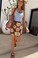 Thumbnail for Jaden Beaded Skirt in brown with cream floral beading, styled with a light blue ribbed tank top.