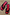 Thumbnail for Black Leather Stud Sandals featuring a square toe, silver studs and a red footbed, displayed on a woven mat.