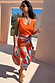 Thumbnail for Blue Poppy Jaspre Skirt with an orange floral print on light blue fabric and iconic wrap tie fastening.