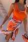 Thumbnail for Iconic Blue Poppy Jaspre Skirt in a satin-feel fabric with orange floral print and multi-wear wrap tie fastening.