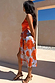 Thumbnail for Iconic Blue Poppy Jaspre Skirt featuring an orange poppy print and adjustable multi-wear wrap tie.