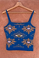 Blue Eye Knitted Cami Top with heart and eye motifs and a square neckline, hanging on a wooden hanger.