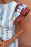 Blue Stripe Alena Midi Dress with contrast burgundy ruffle sleeves and gold jewellery in a cotton-linen blend.
