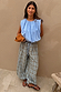 Blue Stripe Bubble Top with a sleeveless bubble silhouette and elasticated hem, paired with wide-leg check trousers.