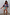 Thumbnail for Blue Mari Cardigan with orange and turquoise paisley print, styled as a co-ord with a matching skirt.