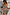 Thumbnail for Blue Mari Plisse Bandeau Top in a multi-coloured paisley Mari print, styled with matching trousers for a vacation co-ord.