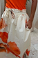Blurred Floral Midi Skirt in cream cotton with orange motifs, featuring a frill drawstring waistband and side pockets.