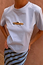 Cadillac Baby T-Shirt in blue stretch cotton with a retro car motif, styled with a striped skirt.