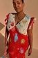 Red Celestial Midi Dress featuring a sun and hand print, V-neck blouson top and ruffled sleeves on a curve model.