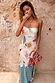 Reversible Celestial Patti Dress with sun motifs and a contrast blue star hem, worn by a size 10 model.