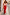 Thumbnail for Red Celestial Midi Dress featuring sun motifs and ruffled sleeves with a V-neck blouson top, worn on a street.