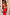 Thumbnail for Red Celestial Midi Dress with cream motifs and ruffled sleeves, viewed from the back in a street setting.